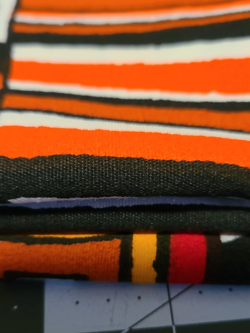 Geometric Fabric Red Brown Orange Yellow White